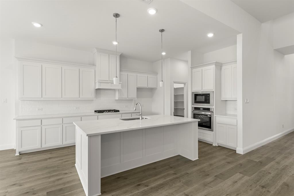 507 Pinnacles Court Forney, TX 75126 - Photo 8 of 31 08. 507 Pinnacles - Kitchen (2)