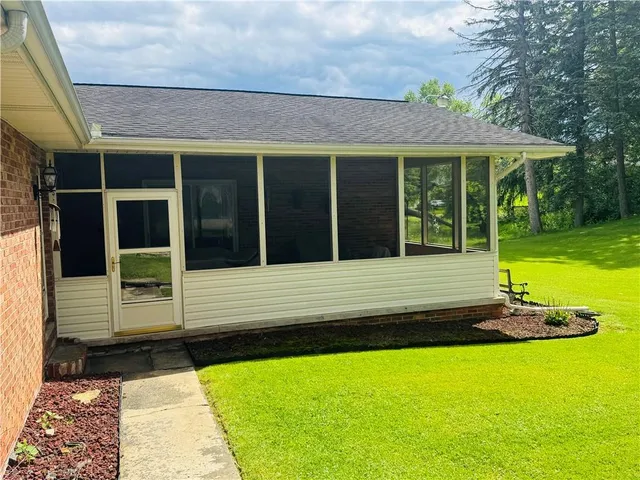 a view of a house with a garden