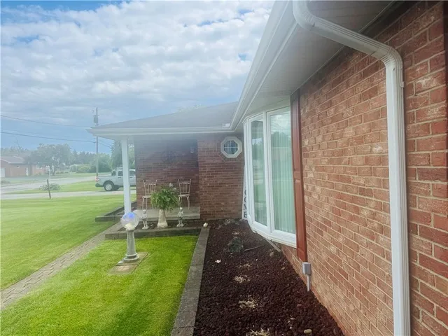 a view of a porch with a yard