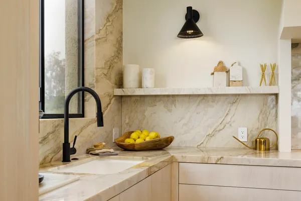 a kitchen with a stove and a cabinet