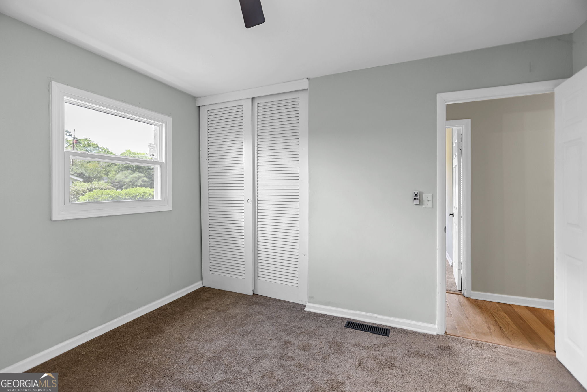 7060 Scenic Heights Road Manchester, GA 31816 - Photo 22 of 52 an empty room with windows