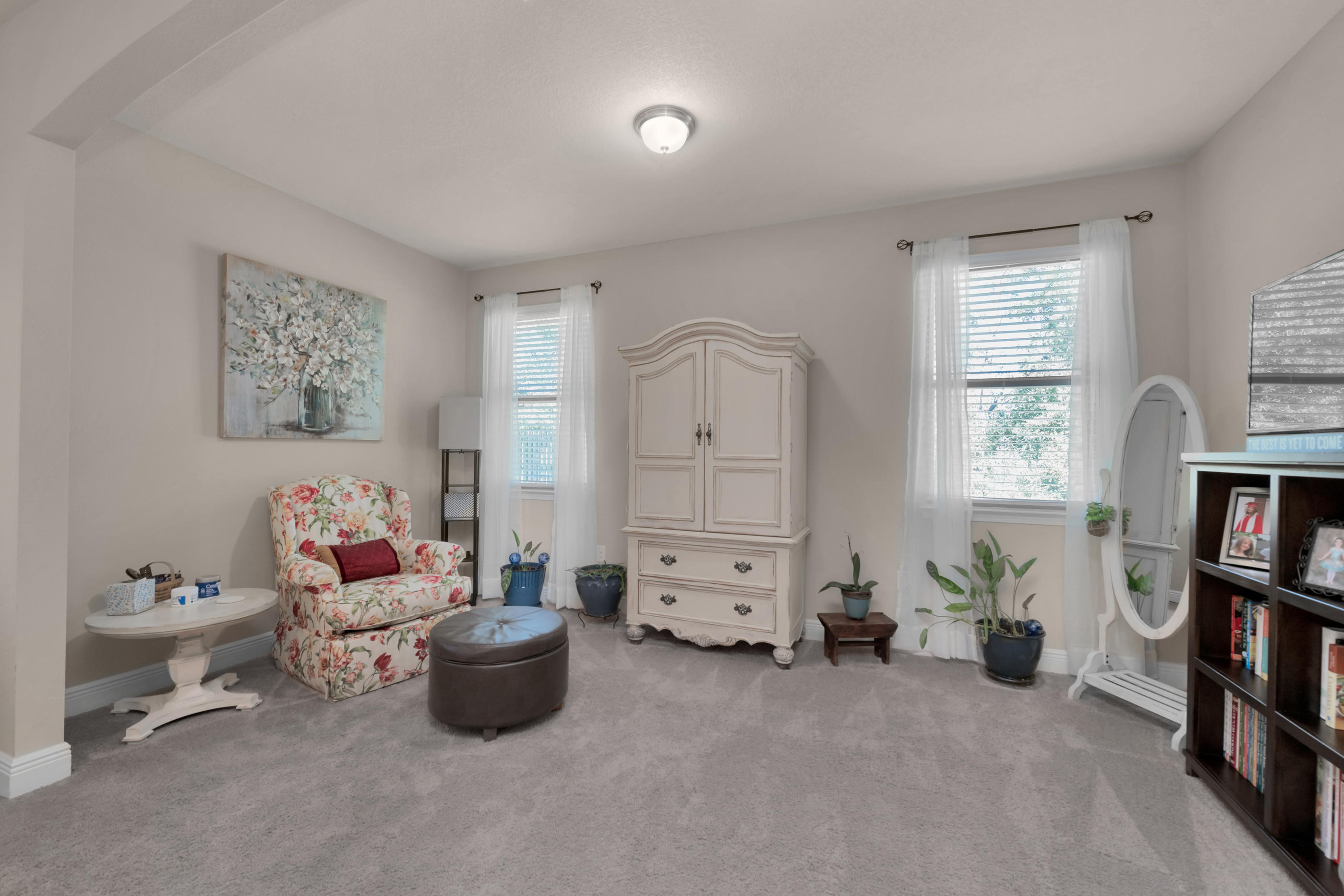 514 Brighton Cove Freeport, FL 32439 - Photo 18 of 32 a living room with furniture and a book shelf