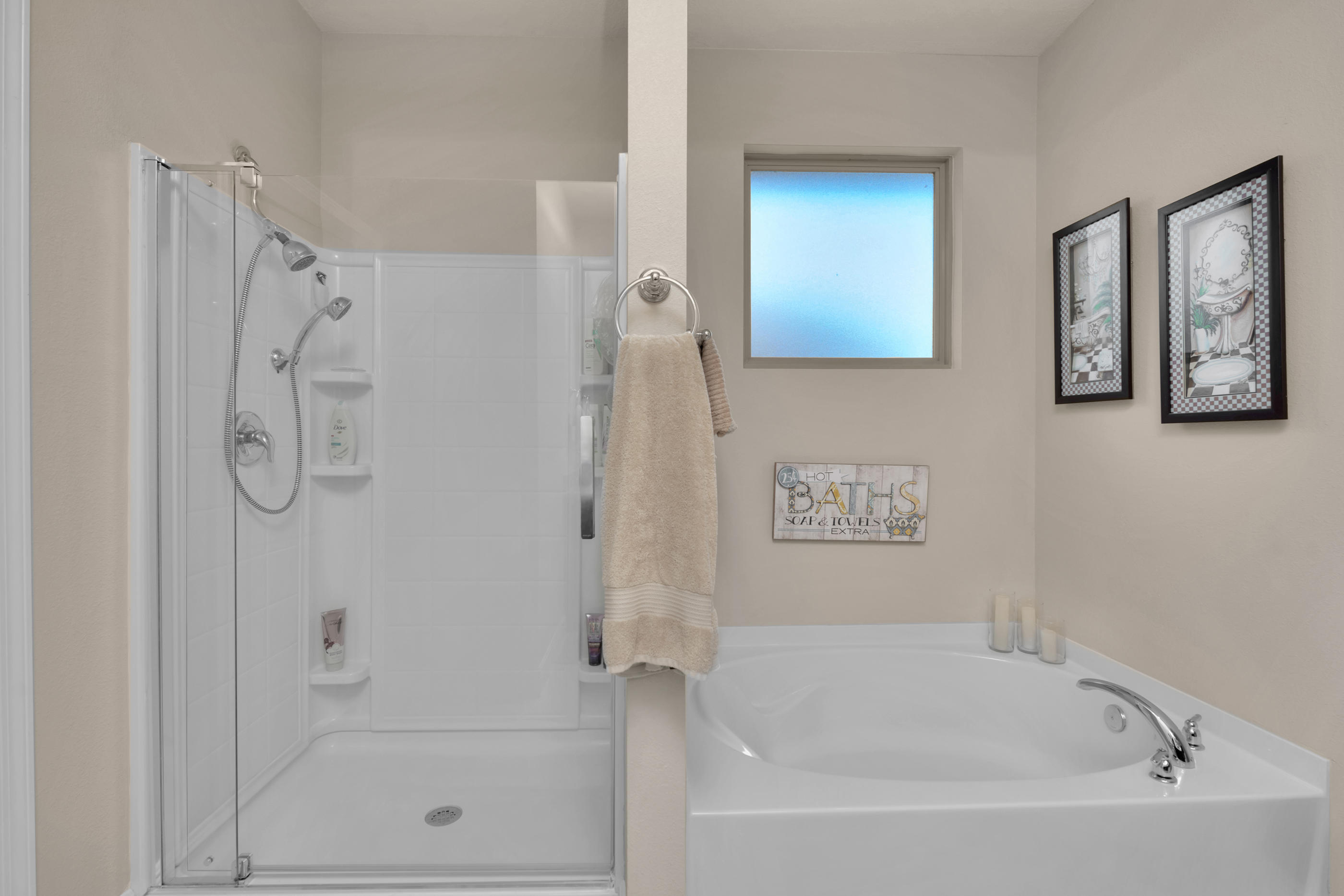 514 Brighton Cove Freeport, FL 32439 - Photo 20 of 32 a bathroom with a bathtub and a shower