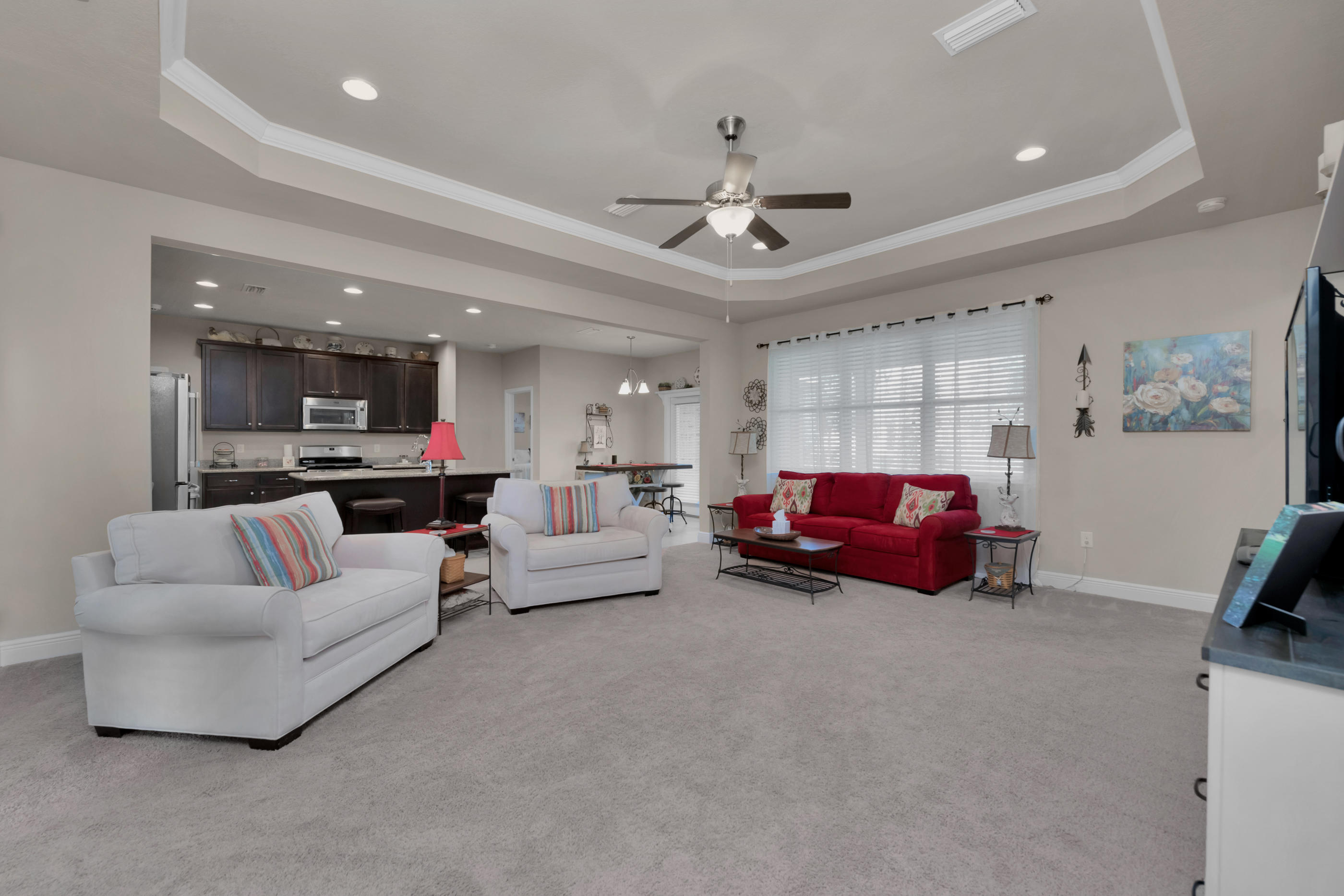 514 Brighton Cove Freeport, FL 32439 - Photo 4 of 32 a living room with furniture and a flat screen tv