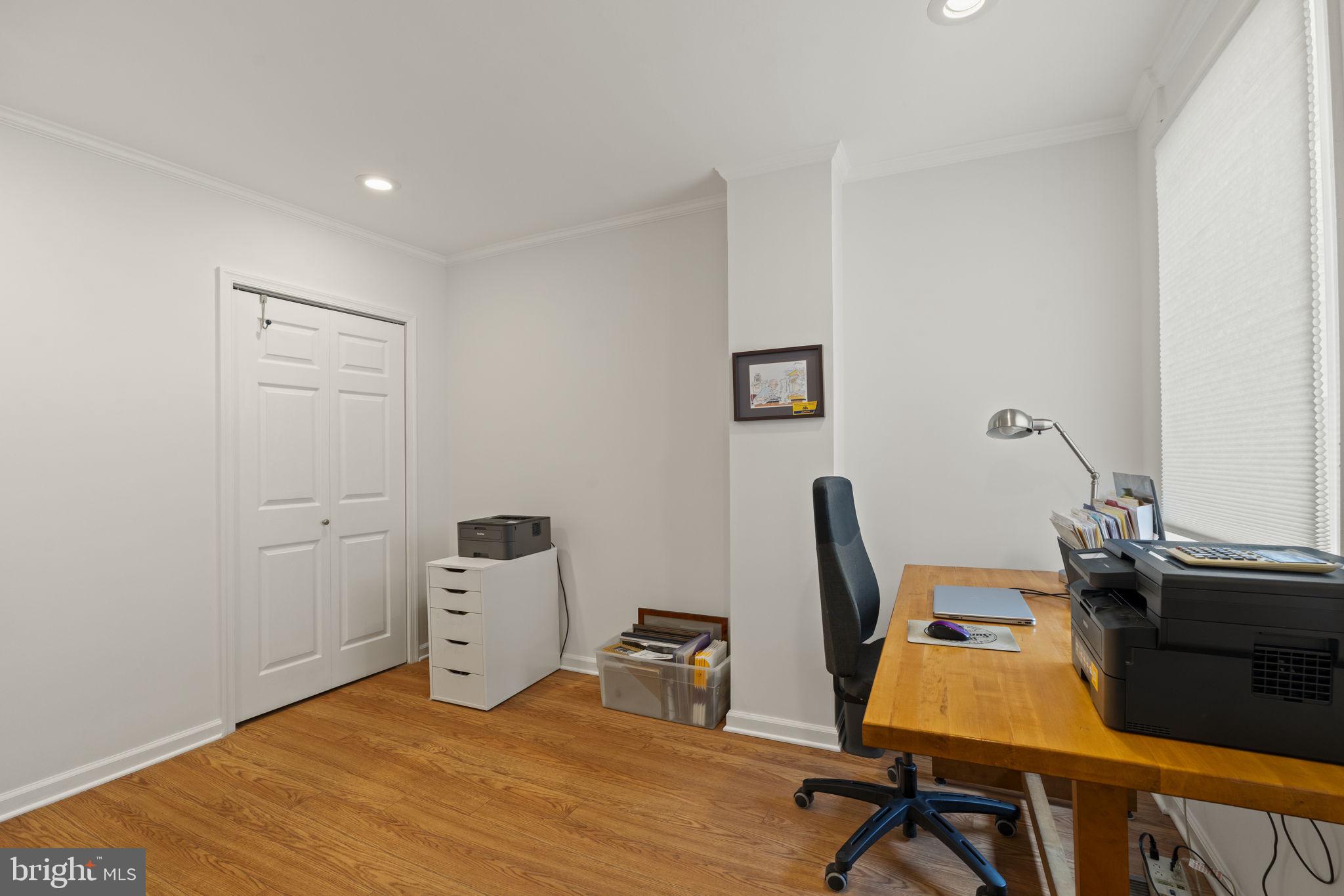 1913 Carpenter Street Philadelphia, PA 19146 - Photo 17 of 39 a workspace with furniture and wooden floor