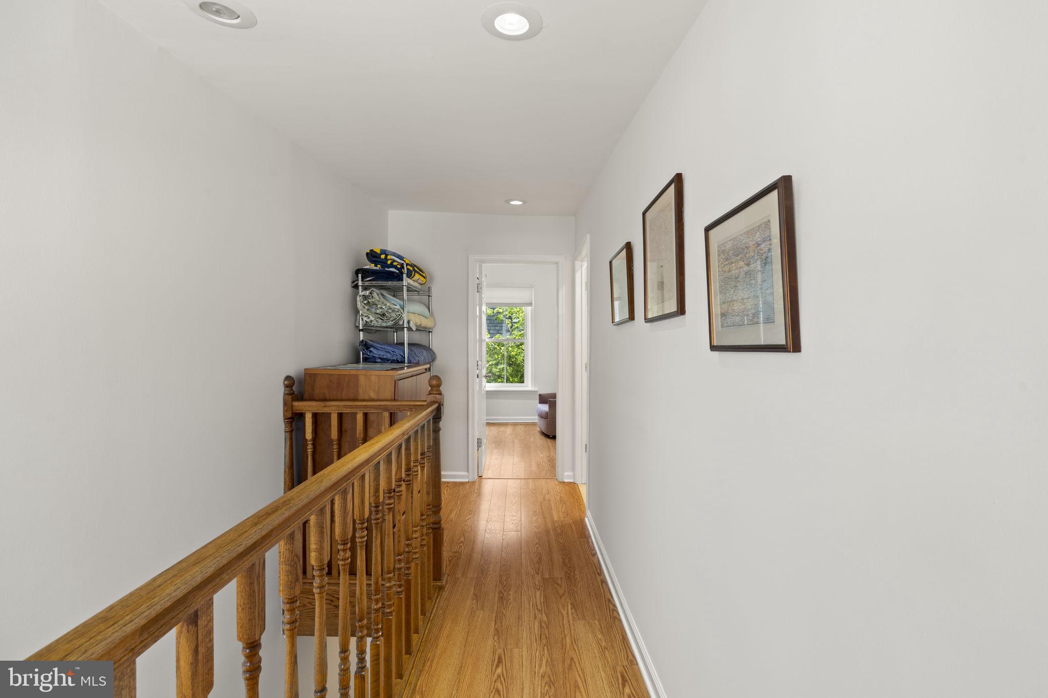 1913 Carpenter Street Philadelphia, PA 19146 - Photo 23 of 39 a view of a hallway with wooden floor and stairs