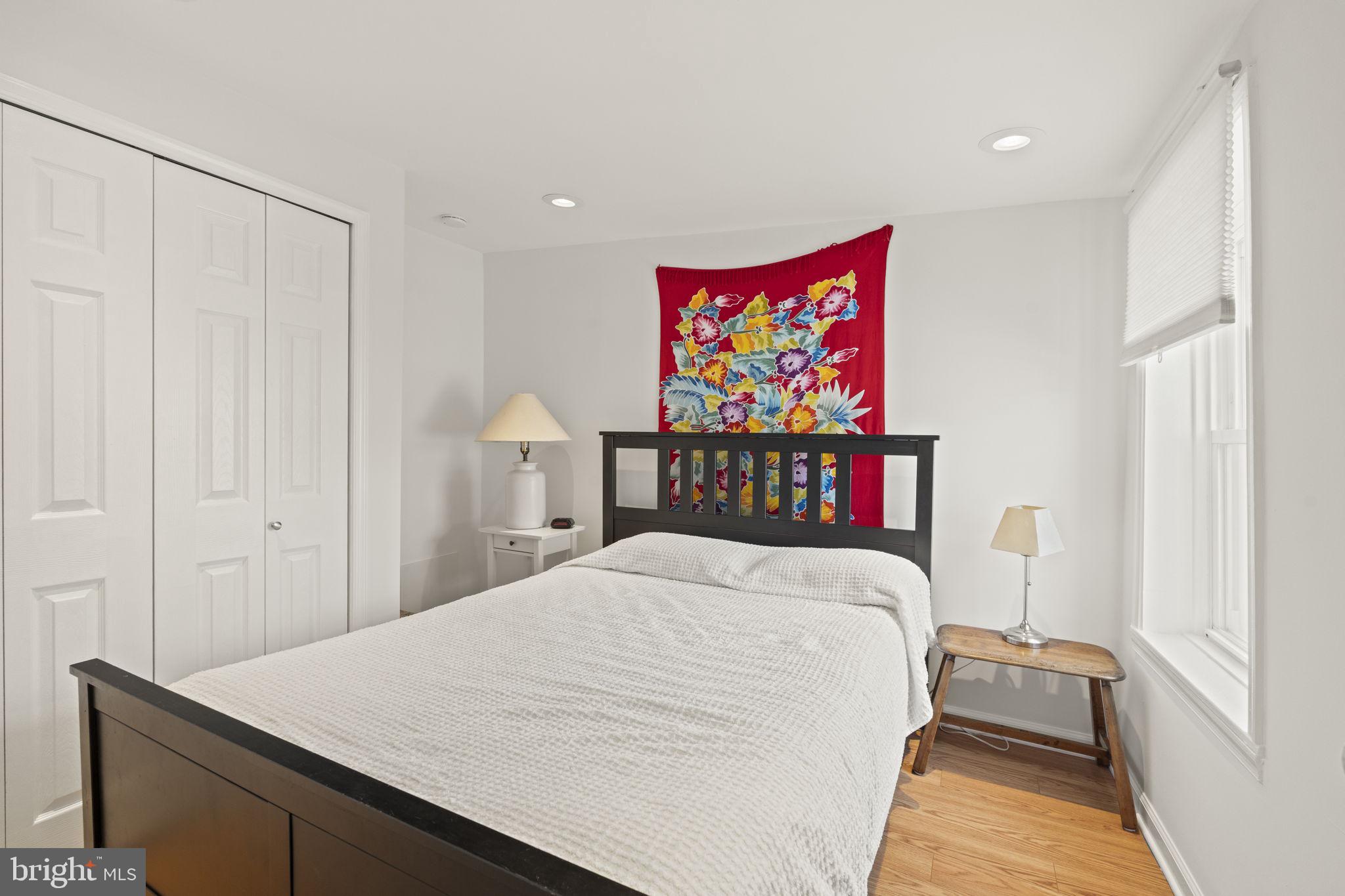 1913 Carpenter Street Philadelphia, PA 19146 - Photo 24 of 39 a bedroom with a bed and a table