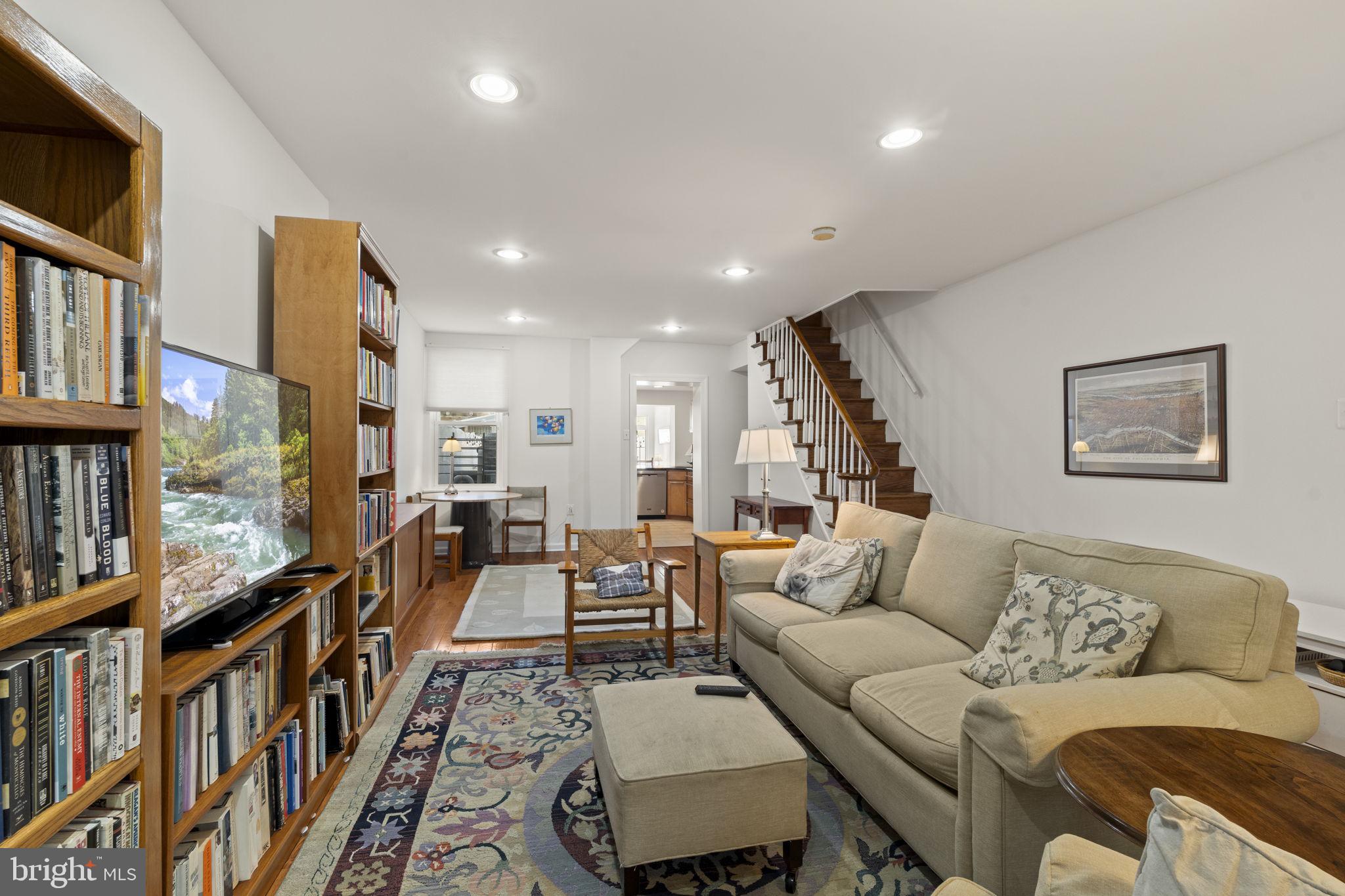 1913 Carpenter Street Philadelphia, PA 19146 - Photo 6 of 39 a living room with furniture and a book shelf