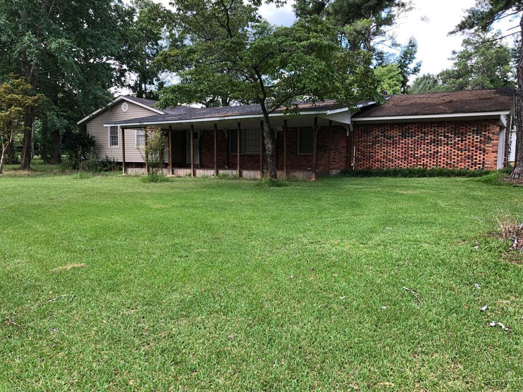 1348 Main Street Perry, GA 31069 - Photo 1 of 20 front view of house with a yard