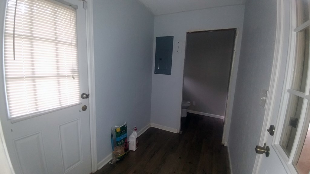 1348 Main Street Perry, GA 31069 - Photo 11 of 20 a view of hallway with wooden floor and a window
