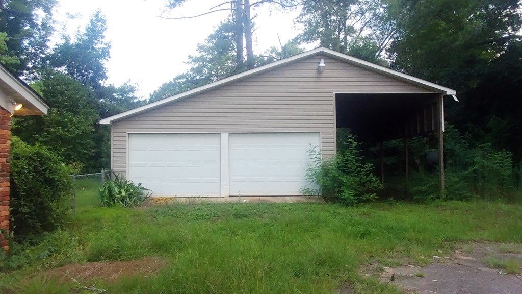 1348 Main Street Perry, GA 31069 - Photo 16 of 20 a front view of house with garden