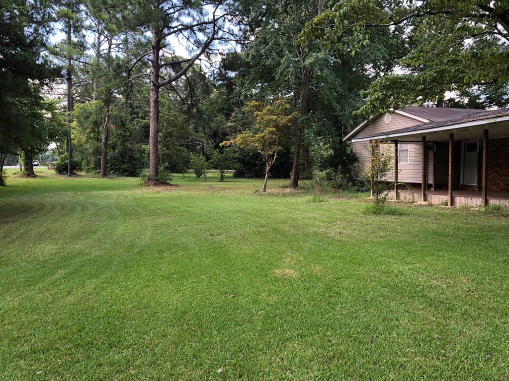 1348 Main Street Perry, GA 31069 - Photo 4 of 20 a view of a house with a backyard