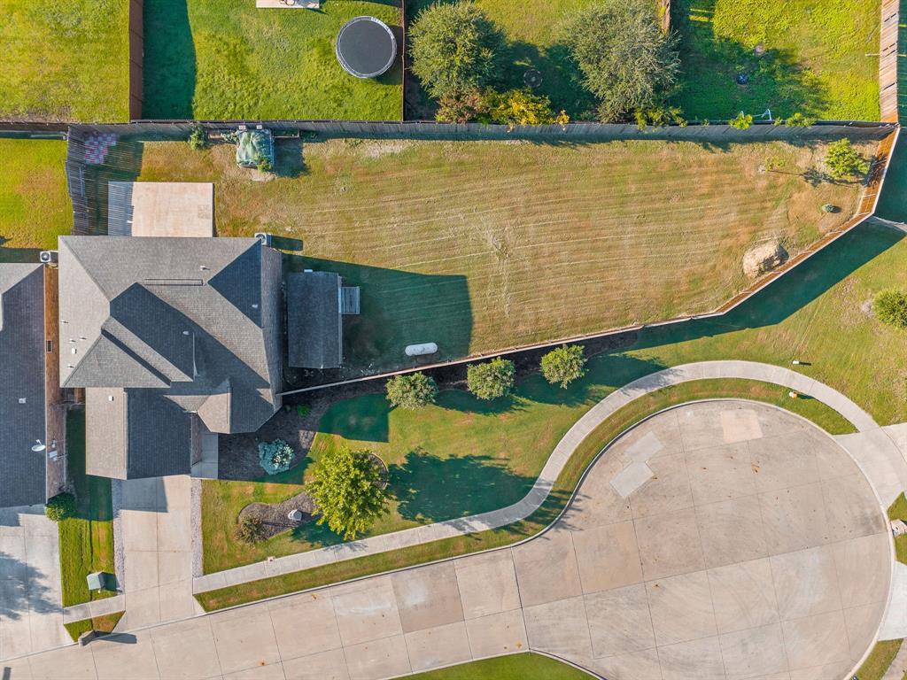 144 Perkins Street Anna, TX 75409 - Photo 27 of 31 an aerial view of a house with a lake view