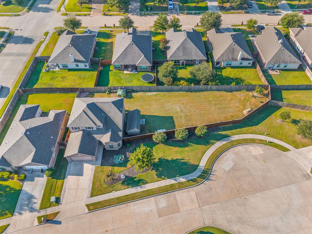 144 Perkins Street Anna, TX 75409 - Photo 28 of 31 an aerial view of residential houses with outdoor space and swimming pool