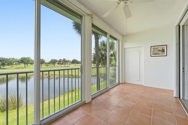 a view of a room with a large window