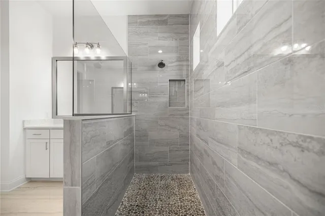 a view of a brick house with a large window