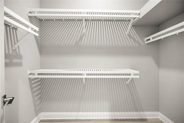 a view of a park with swings and slides