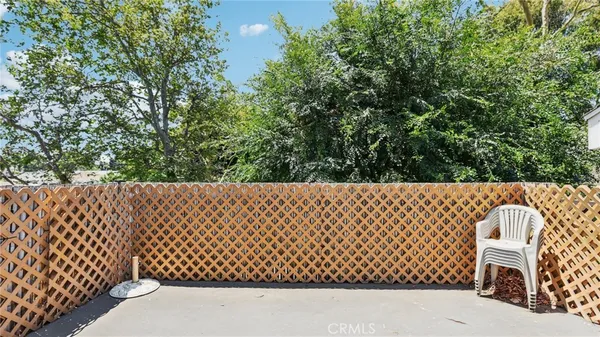 a view of outdoor space with iron fence