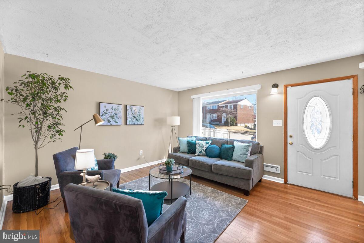 670 Queensgate Road Baltimore, MD 21229 - Photo 5 of 26 Gleaming hardwood flooring