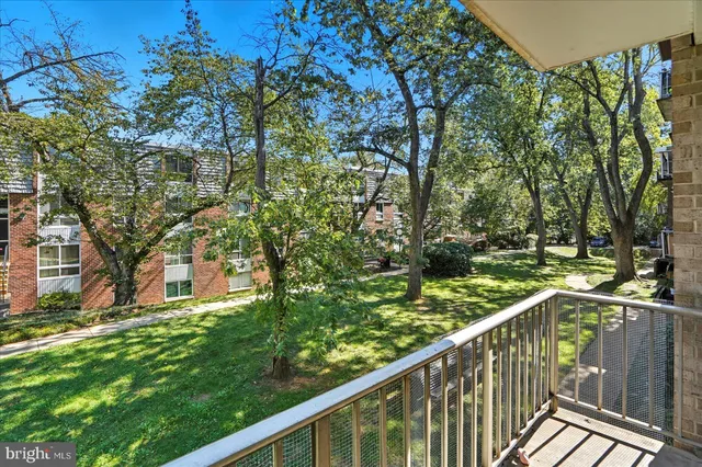 a view of a wooden fence