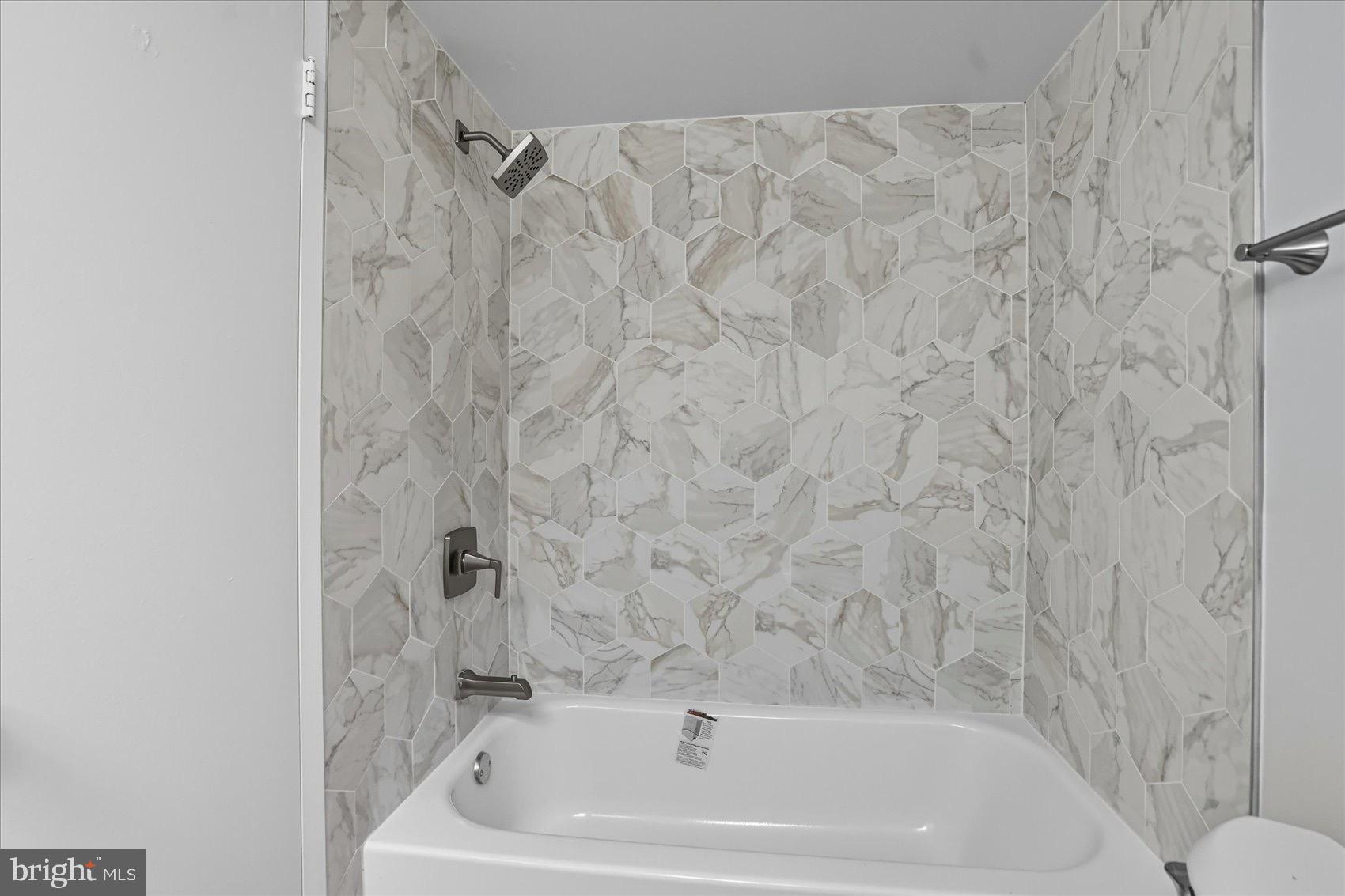 3960 Bel Pre Road, Unit 4 Silver Spring, MD 20906 - Photo 26 of 35 Elegant bath retreat with modern finishes.
