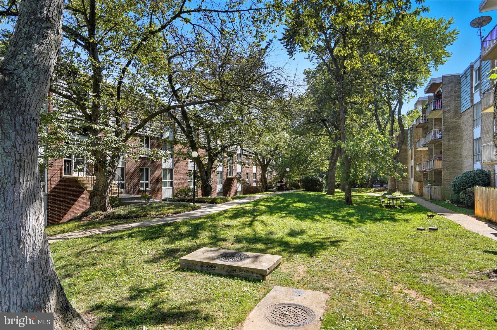 3960 Bel Pre Road, Unit 4 Silver Spring, MD 20906 - Photo 5 of 35 Lush green space in a tranquil community.