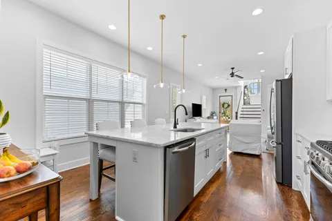 a view of walk in closet with white walls