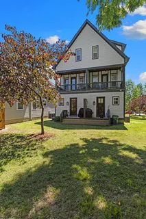 a view of a house with swimming pool