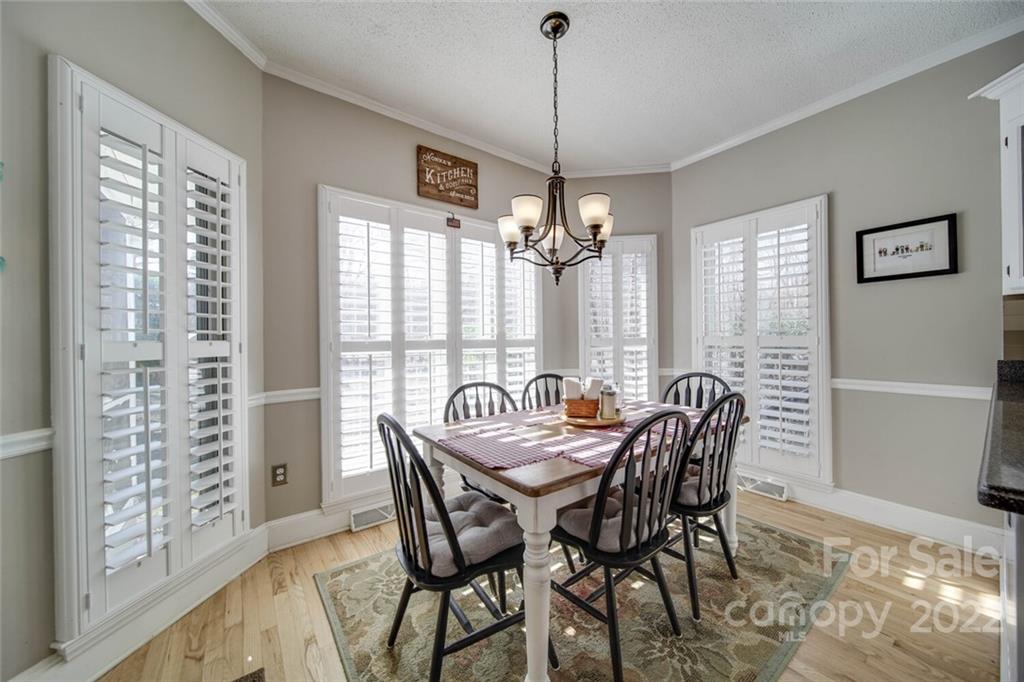 2700 Dutch Road Mount Pleasant, NC 28124 - Photo 16 of 48 a view of a dining room with furniture window and wooden floor