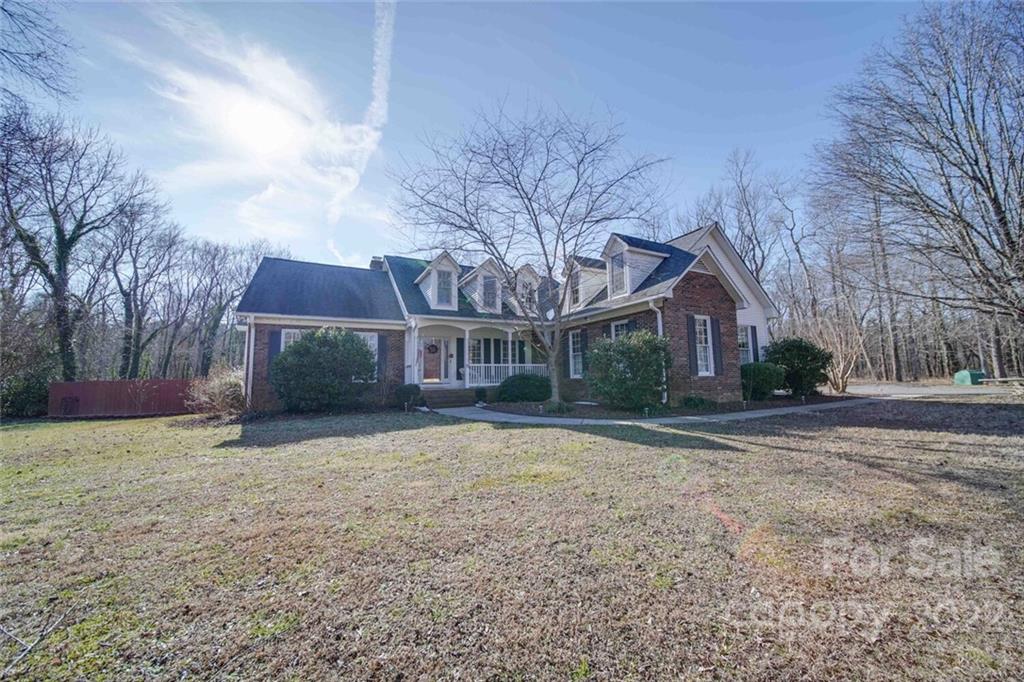 2700 Dutch Road Mount Pleasant, NC 28124 - Photo 2 of 48 a view of a house with a yard
