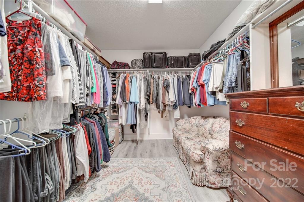 2700 Dutch Road Mount Pleasant, NC 28124 - Photo 28 of 48 a view of walk in closet with clothes