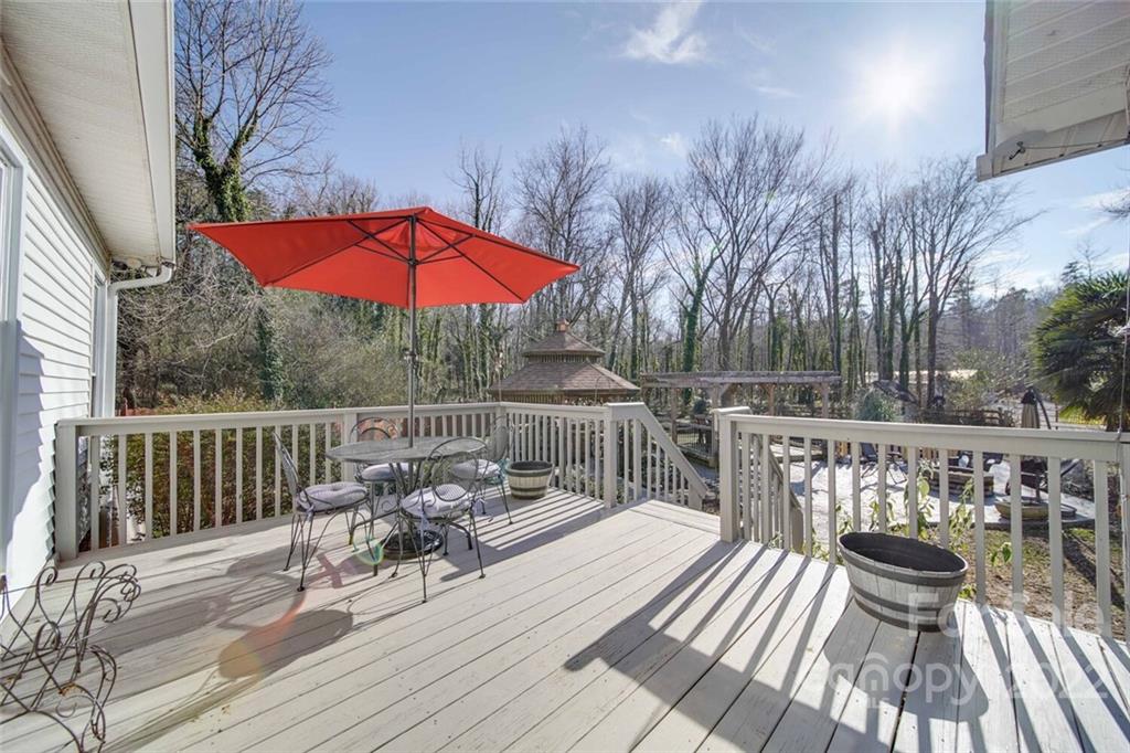 2700 Dutch Road Mount Pleasant, NC 28124 - Photo 39 of 48 a view of balcony with outdoor seating and wooden floor