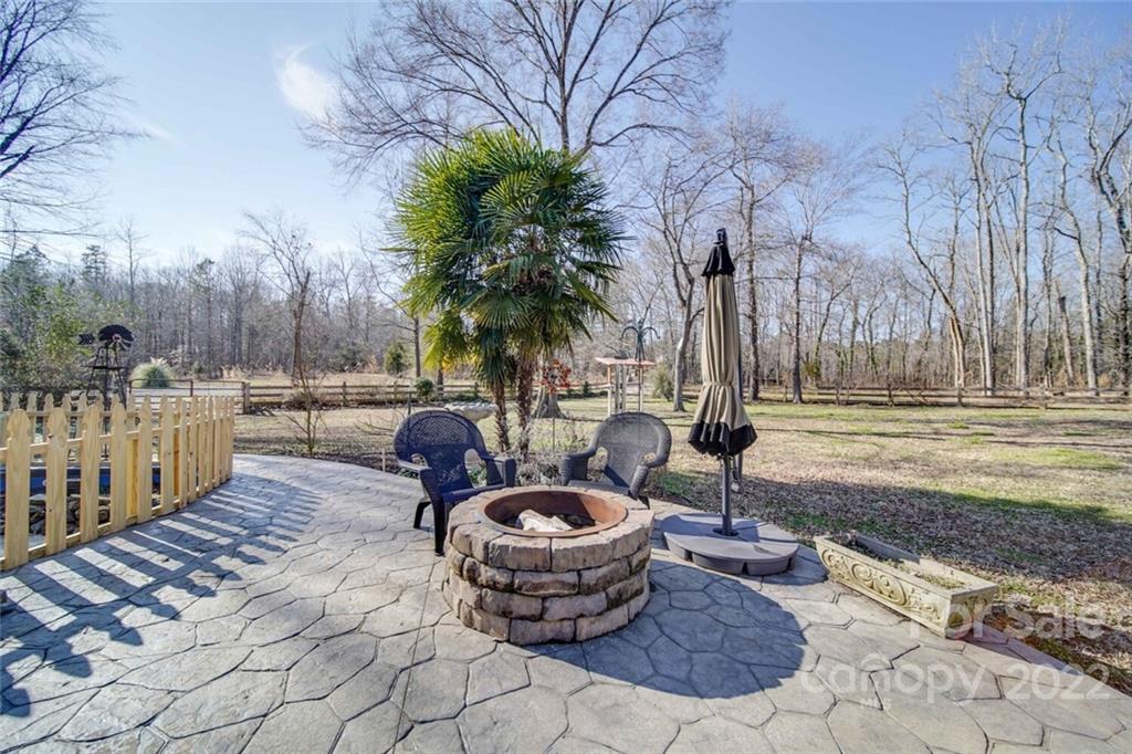 2700 Dutch Road Mount Pleasant, NC 28124 - Photo 42 of 48 a view of a backyard with fountain