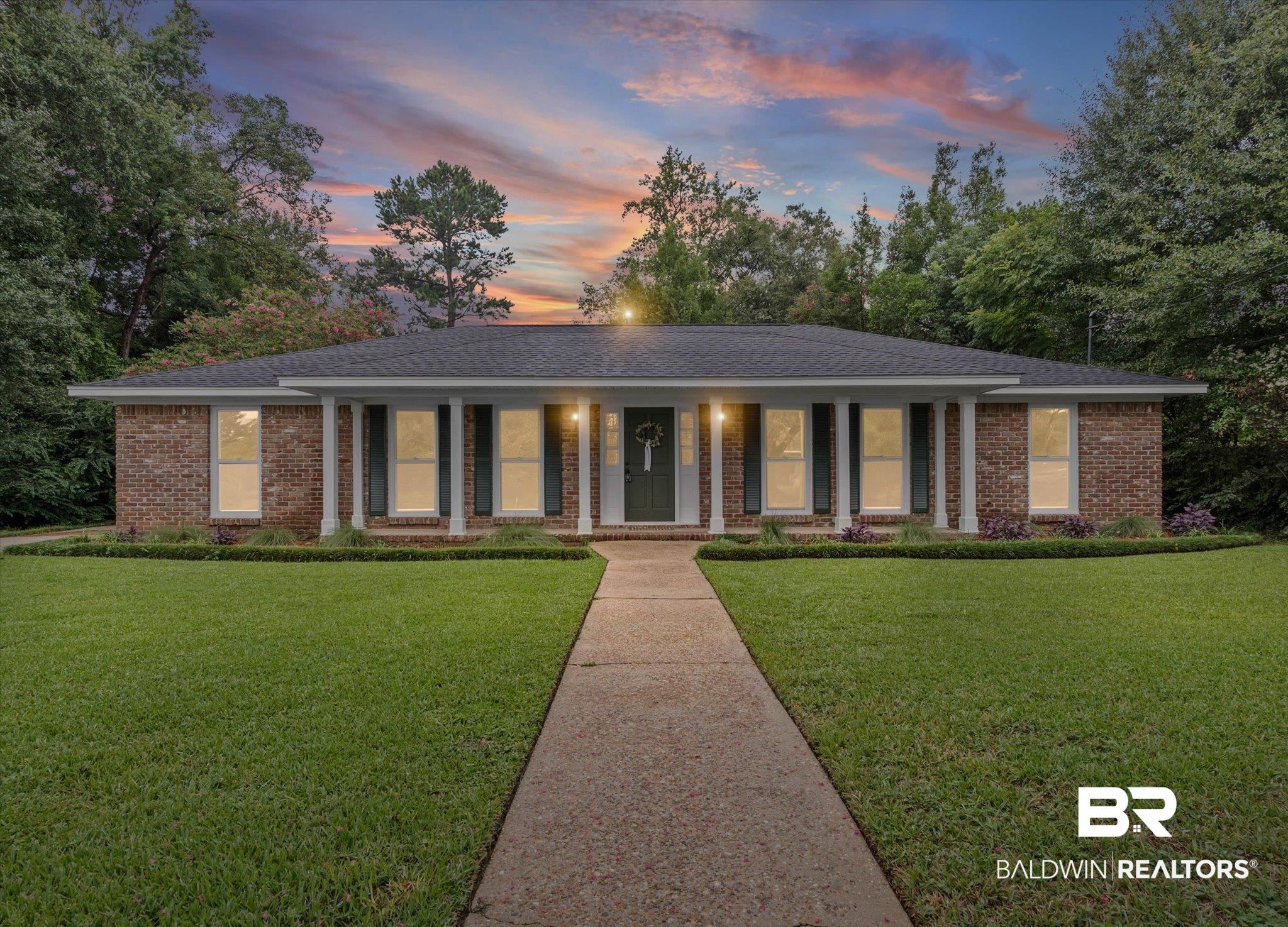3655 Claridge Road South Mobile, AL 36608 - Photo 1 of 32 Ranch-style home with a porch, a lawn, brick siding, and a shingled roof