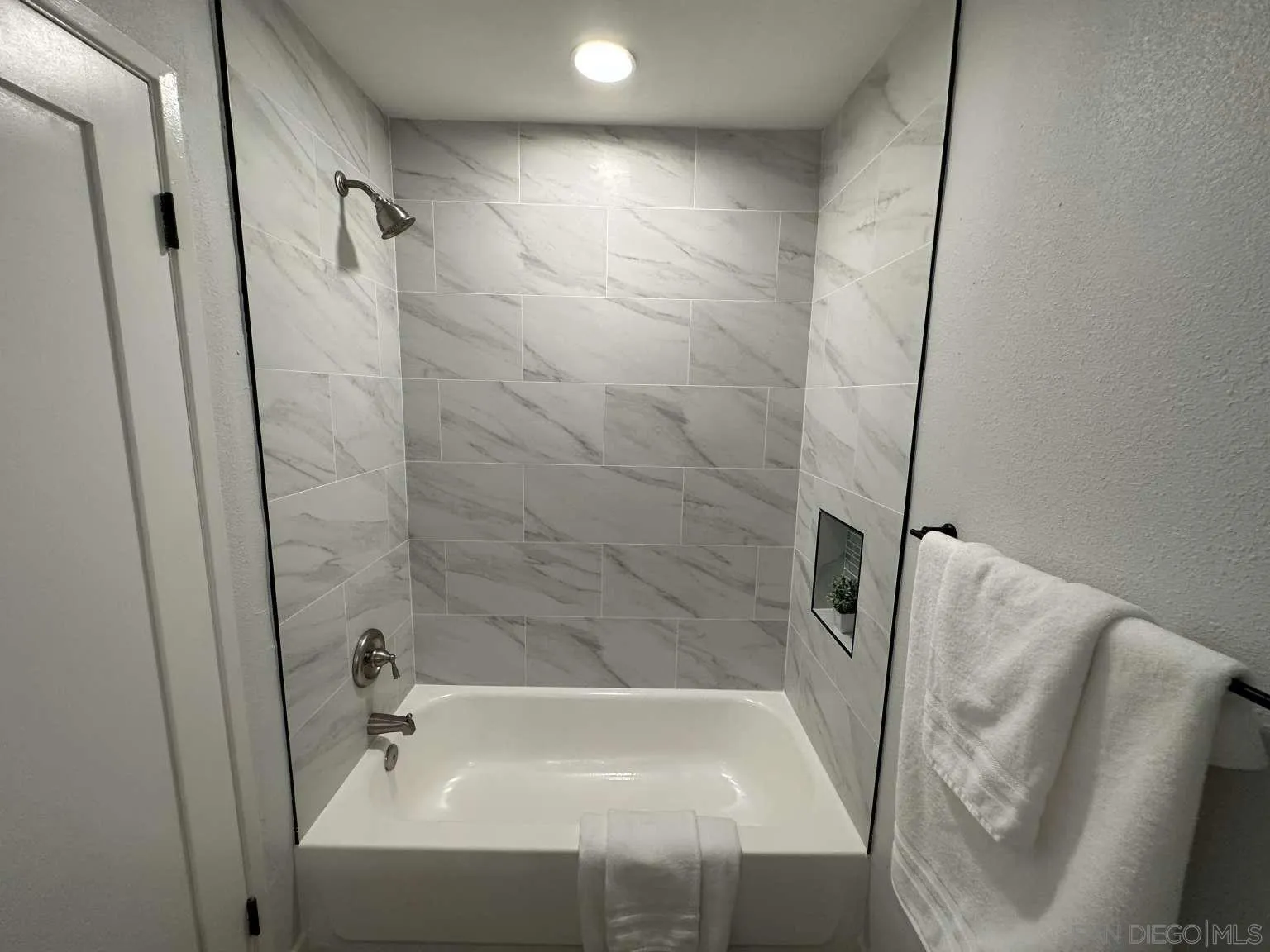 730 Brookstone Road, Unit 104 Chula Vista, CA 91913 - Photo 13 of 22 a bathroom with a bathtub and a shower