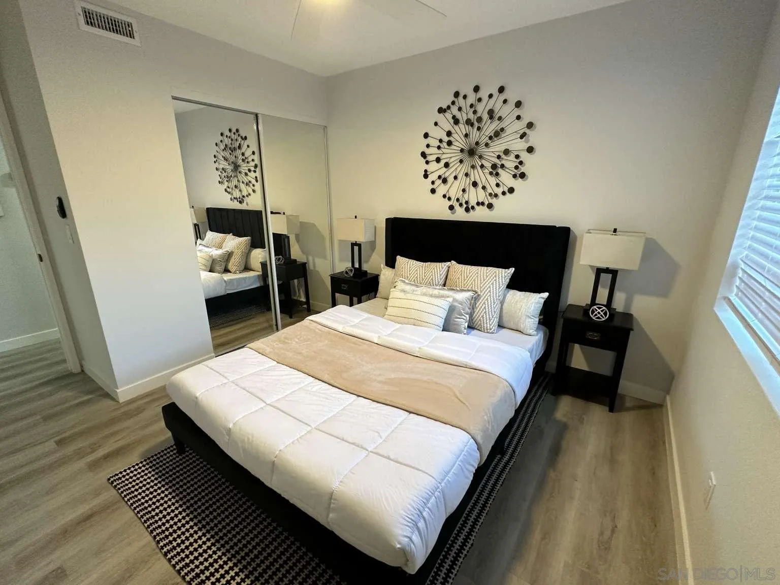 730 Brookstone Road, Unit 104 Chula Vista, CA 91913 - Photo 14 of 22 a bedroom with bed and window