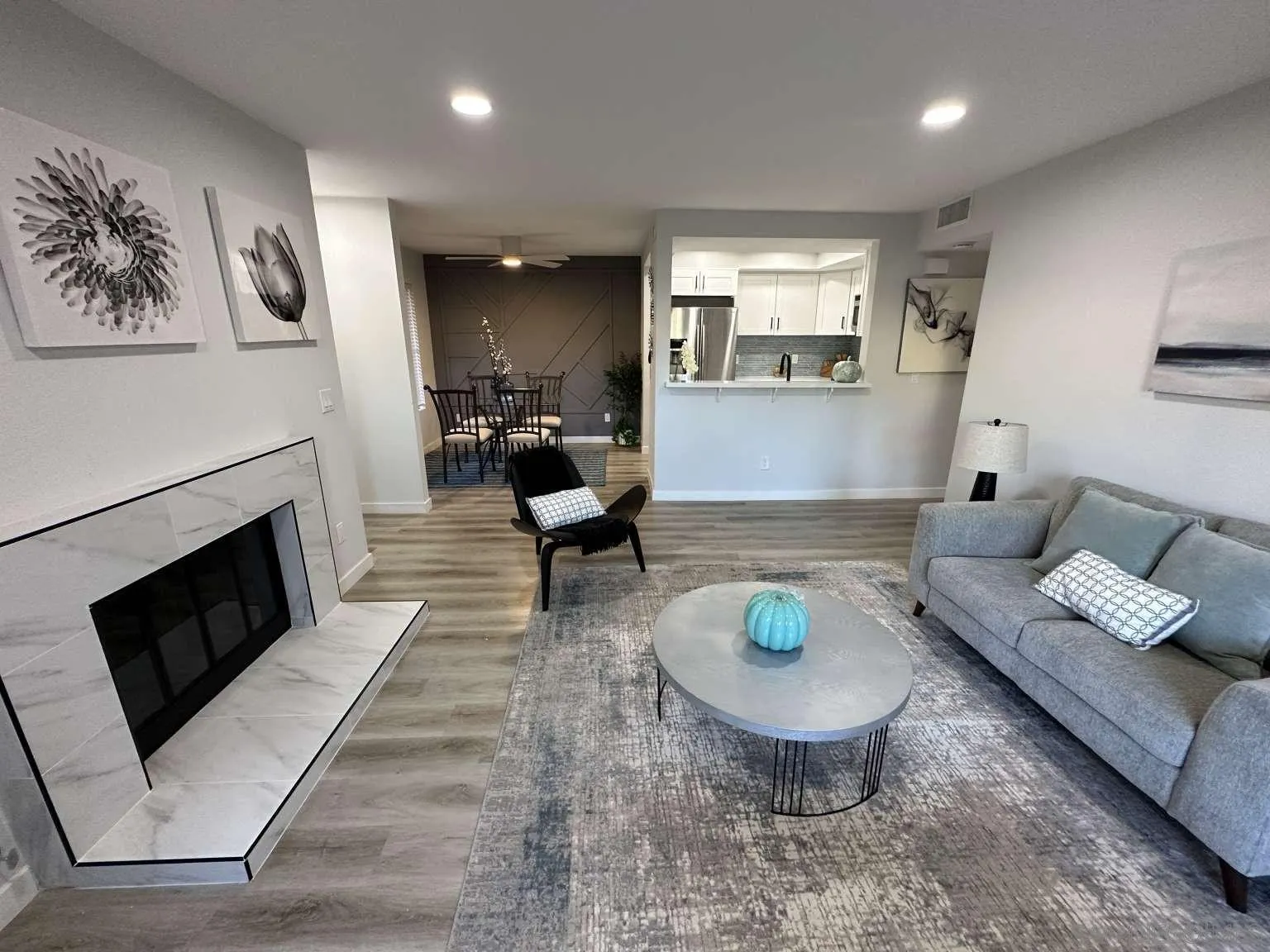 730 Brookstone Road, Unit 104 Chula Vista, CA 91913 - Photo 3 of 22 a living room with furniture and a fireplace