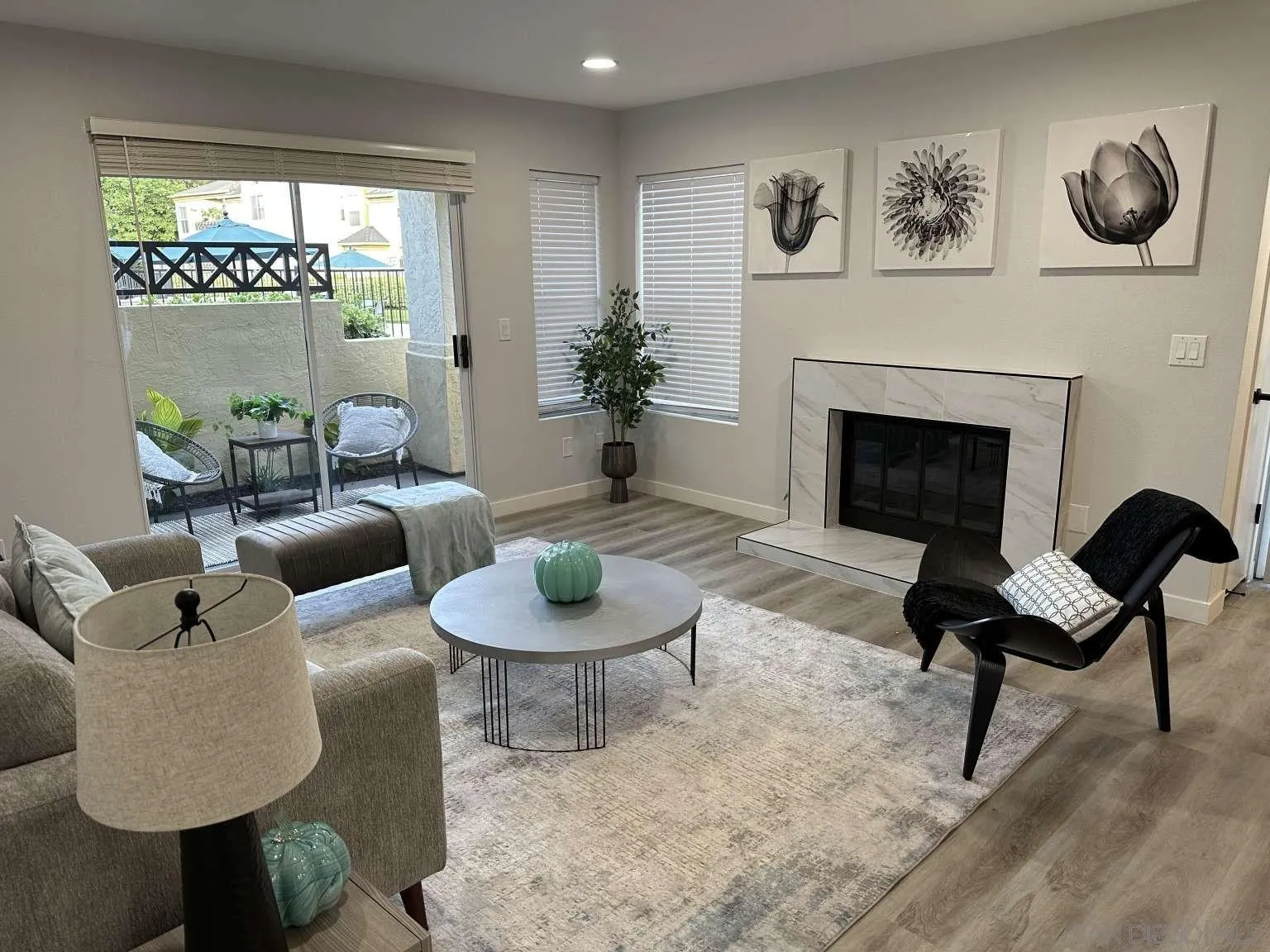 730 Brookstone Road, Unit 104 Chula Vista, CA 91913 - Photo 5 of 22 a living room with furniture and a fireplace