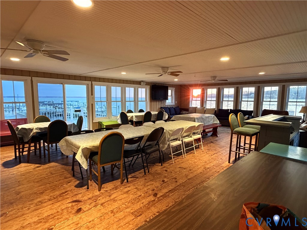 0 Glebe Landing Road Center Cross, VA 22437 - Photo 14 of 20 a bed room with furniture and a large window
