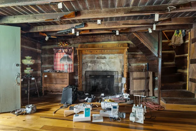a balcony with table and chairs