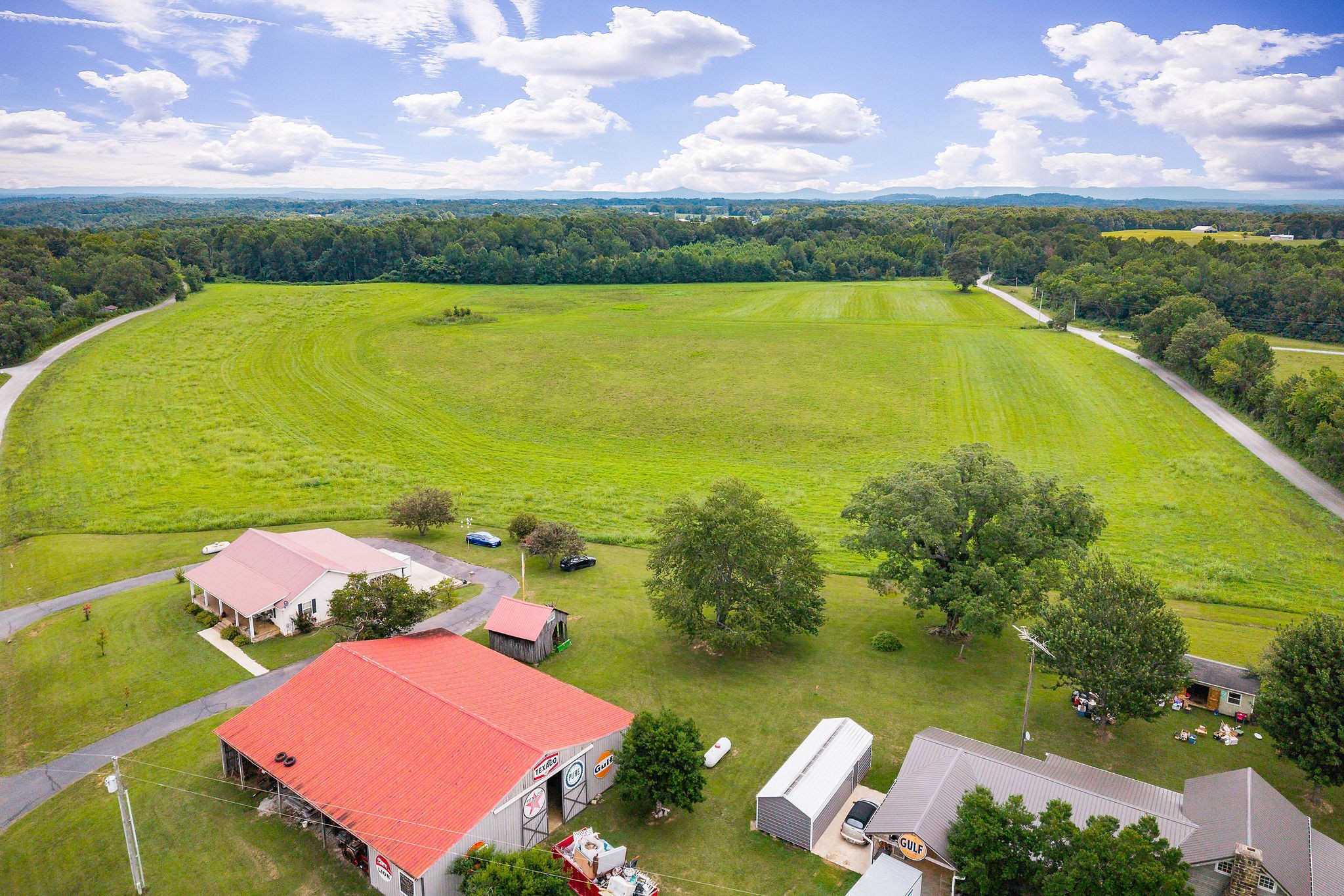 114 Ozone Road Monroe, TN 38573 - Photo 2 of 16 an aerial view of residential houses with outdoor space and lake view