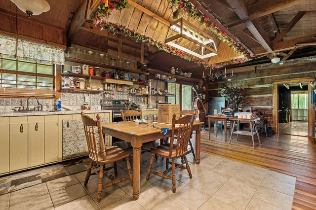 a dining space with furniture and a table