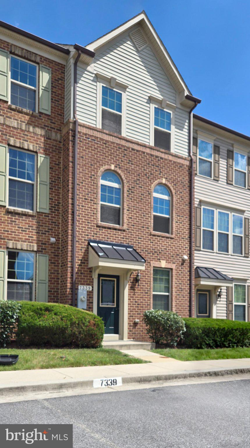 7339 Old Calvary Road Hanover, MD 21076 - Photo 2 of 22 Charming brick townhouse with curb appeal.