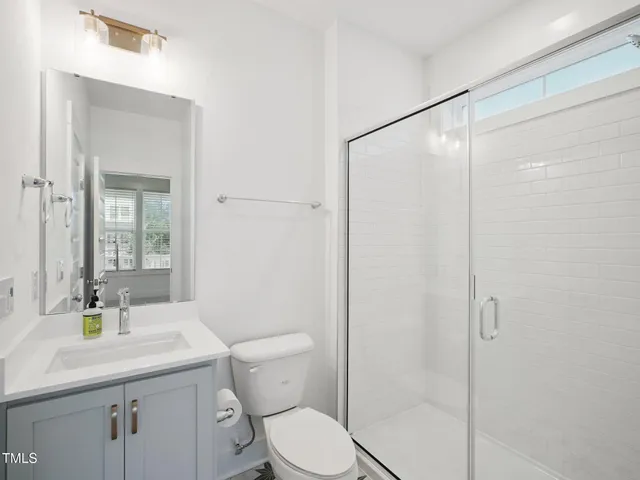 an empty room with closet area