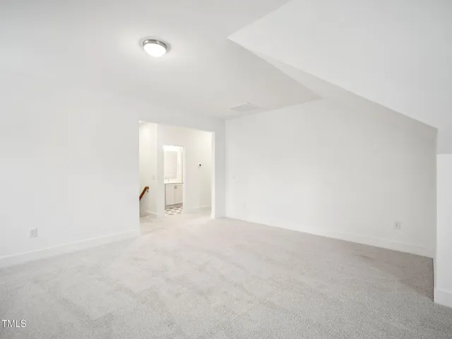 a view of a house with backyard and garden