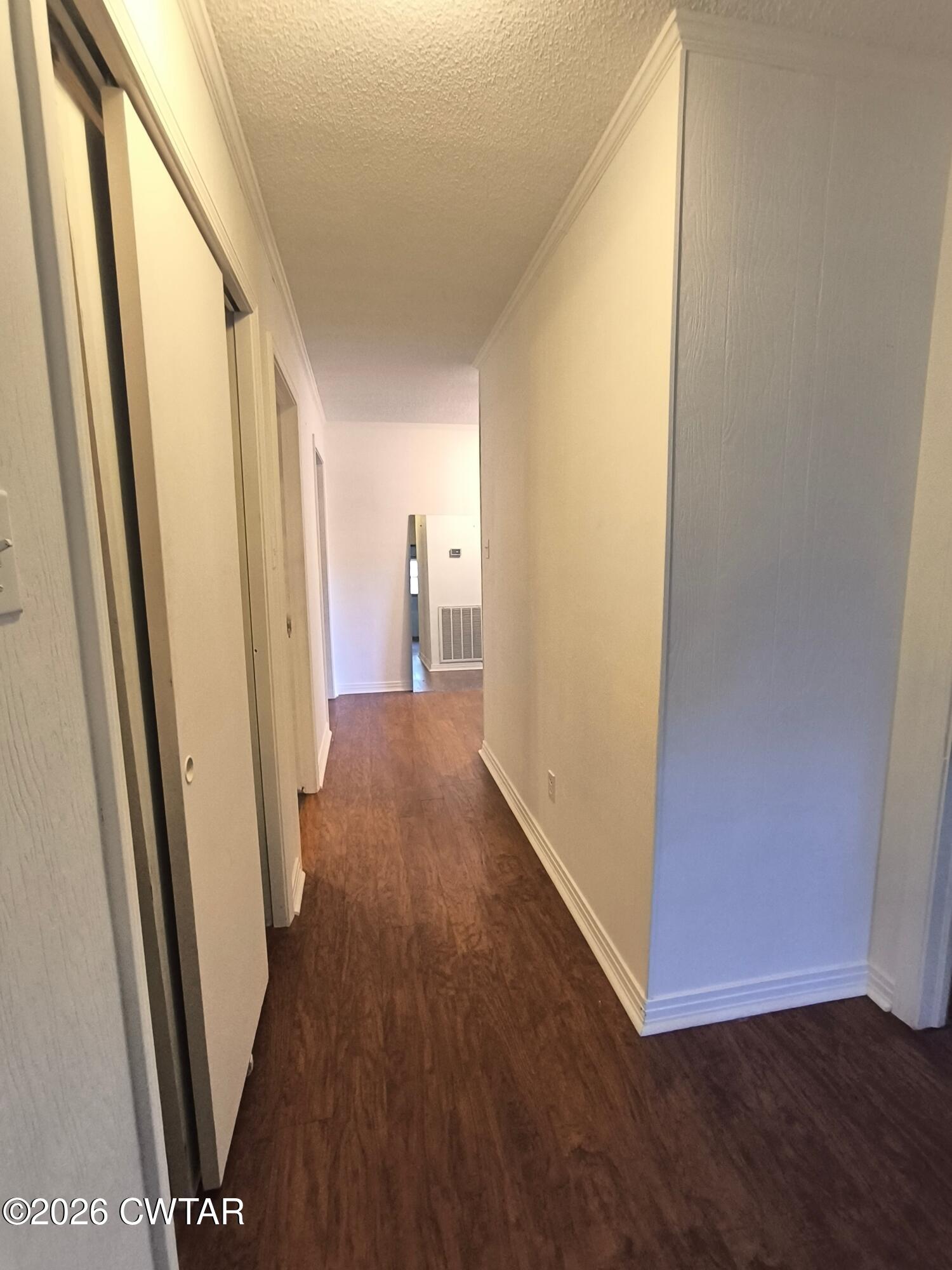 513 Viar Road Dyersburg, TN 38024 - Photo 29 of 37 a view of a hallway with wooden floor