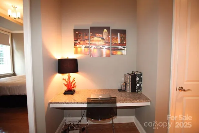 a workspace with furniture and window