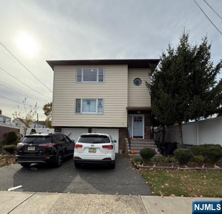 a car parked in front of a house