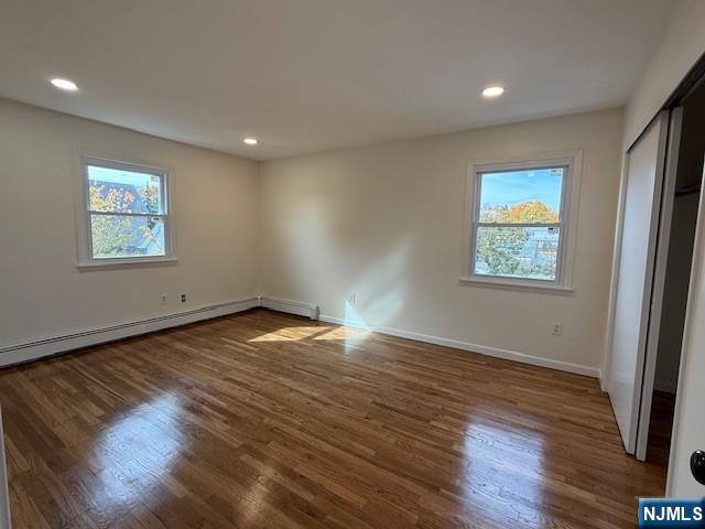 310 Broad Street, Unit 2 Carlstadt, NJ 07072 - Photo 7 of 11 a view of empty room with wooden floor and window