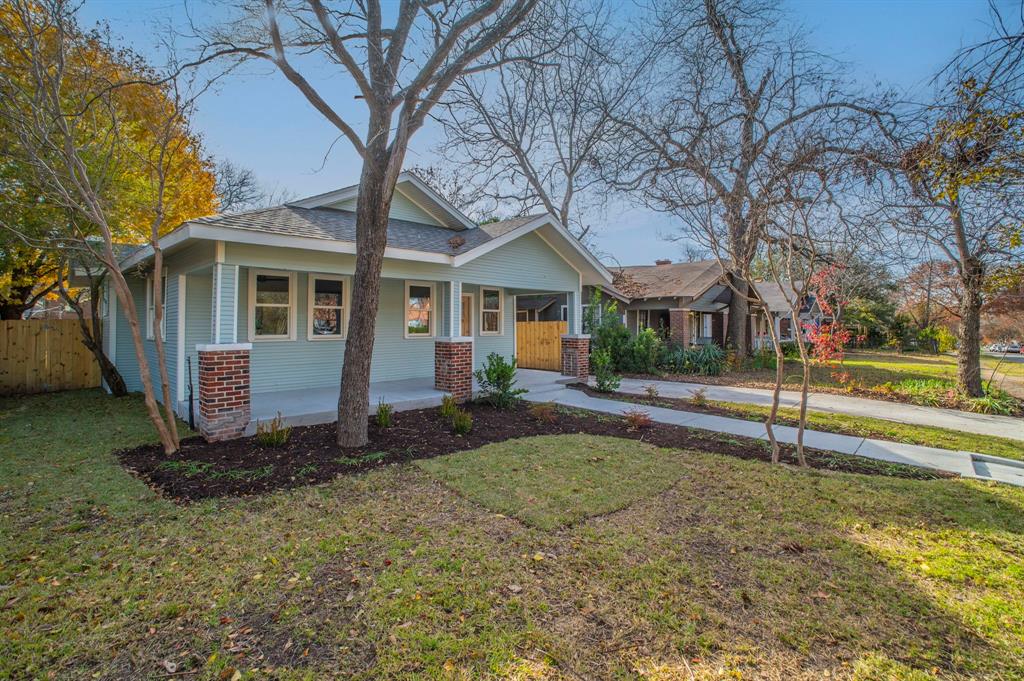 5914 Victor Street Dallas, TX 75214 - Photo 1 of 32 a view of a house with backyard and tree s